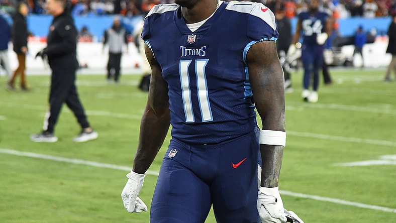 Jan 22, 2022; Nashville, Tennessee, USA; Tennessee Titans wide receiver A.J. Brown (11) leaves the field after a loss against the Cincinnati Bengals during a AFC Divisional playoff football game at Nissan Stadium. Mandatory Credit: Christopher Hanewinckel-USA TODAY Sports