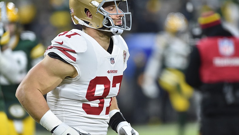 Jan 22, 2022; Green Bay, Wisconsin, USA; San Francisco 49ers defensive end Nick Bosa (97) before the game against the Green Bay Packers in a NFC Divisional playoff football game at Lambeau Field. Mandatory Credit: Jeffrey Becker-USA TODAY Sports