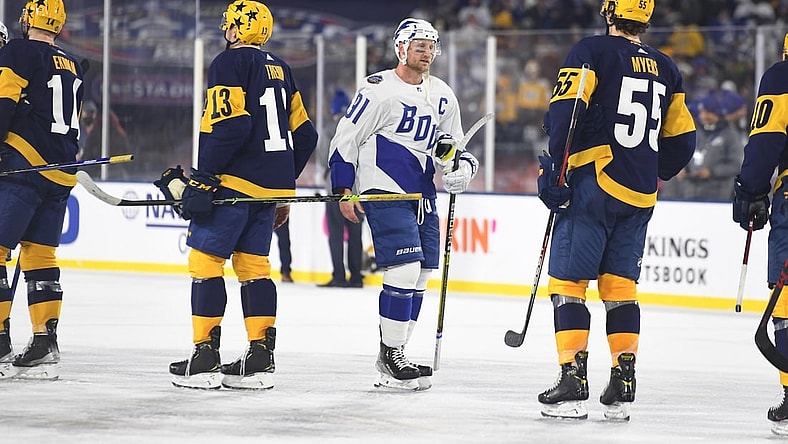 Feb 26, 2022; Nashville, Tennessee, USA; Tampa Bay Lightning center Steven Stamkos (91) leads the team through the hand shake line after a win against the Nashville Predators in a Stadium Series ice hockey game at Nissan Stadium. Mandatory Credit: Christopher Hanewinckel-USA TODAY Sports