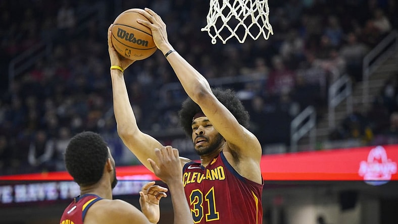 Mar 2, 2022; Cleveland, Ohio, USA; Cleveland Cavaliers center Jarrett Allen (31) grabs a rebound in the second quarter against the Charlotte Hornets at Rocket Mortgage FieldHouse. Mandatory Credit: David Richard-USA TODAY Sports