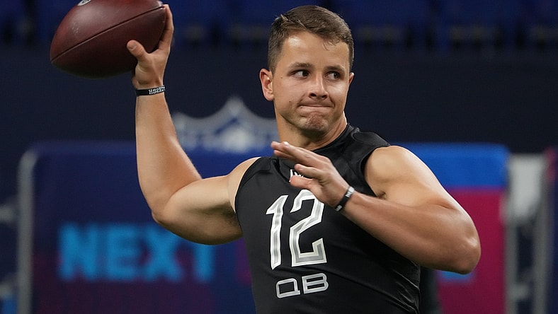 Mar 3, 2022; Indianapolis, IN, USA; Iowa State quarterback Brock Purdy (QB12) goes through drills during the 2022 NFL Scouting Combine at Lucas Oil Stadium. Mandatory Credit: Kirby Lee-USA TODAY Sports