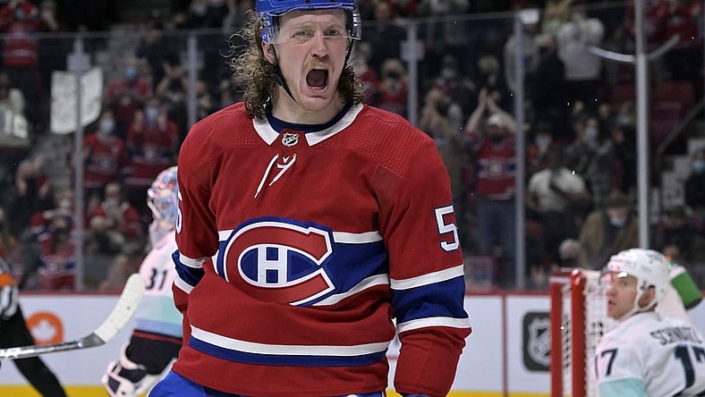 Mar 12, 2022; Montreal, Quebec, CAN; Montreal Canadiens forward Michael Pezzetta (55) reacts after scoring a goal against Seattle Kraken goalie Philipp Grubauer (31) during the first period at the Bell Centre. Mandatory Credit: Eric Bolte-USA TODAY Sports