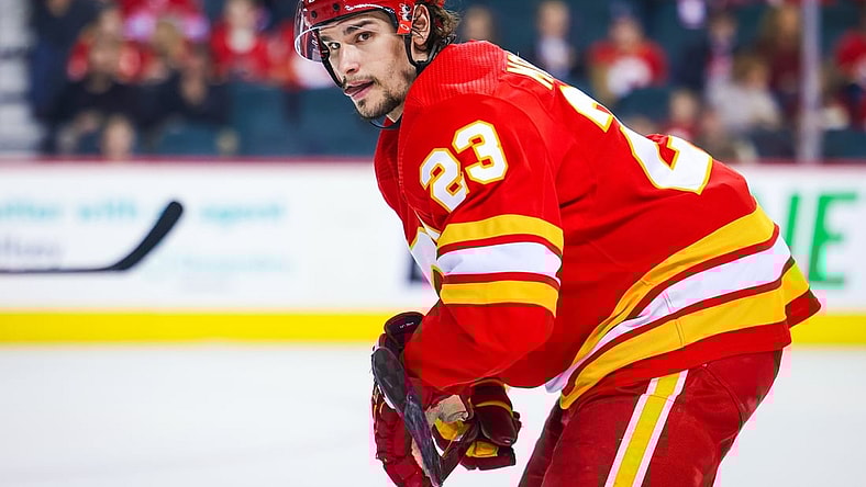Mar 12, 2022; Calgary, Alberta, CAN; Calgary Flames center Sean Monahan (23) during the face off against the Detroit Red Wings during the second period at Scotiabank Saddledome. Mandatory Credit: Sergei Belski-USA TODAY Sports