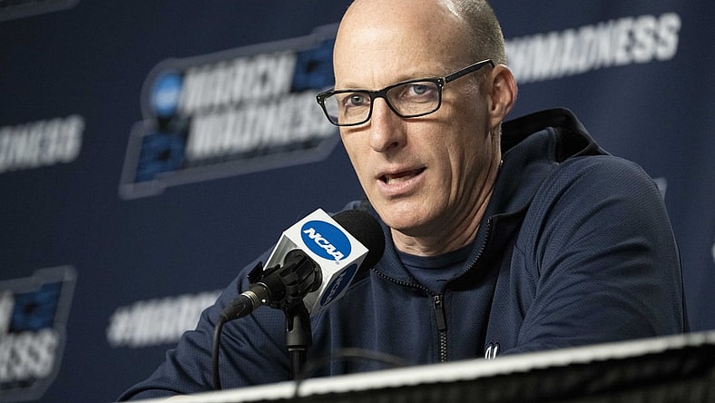 Mar 16, 2022; Portland, OR, USA; Akron Zips head coach John Groce answers questions from reporters during a press conference at Moda Center. Mandatory Credit: Troy Wayrynen-USA TODAY Sports