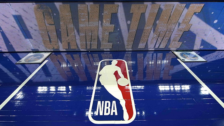 Mar 12, 2022; San Francisco, California, USA; A view of the NBA logo painted on the sideline before the game between the Golden State Warriors and the Milwaukee Bucks at Chase Center. Mandatory Credit: Darren Yamashita-USA TODAY Sports