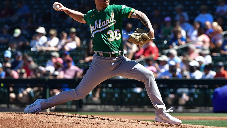 Mar 23, 2022; Mesa, Arizona, USA; Oakland Athletics relief pitcher Adam Oller (36) throws in the first inning against the Chicago Cubs during spring training at Sloan Park. Mandatory Credit: Matt Kartozian-USA TODAY Sports