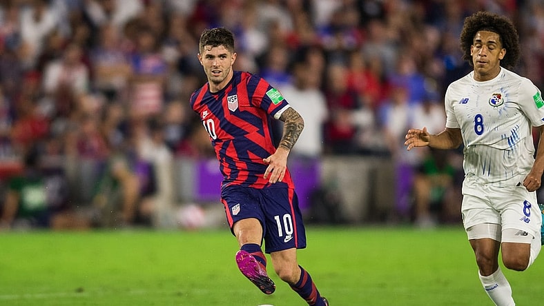 Mar 27, 2022; Orlando, Florida, USA; United States forward Christian Pulisic (10) passes the ball against Panama in the second half during a FIFA World Cup Qualifier soccer match at Exploria Stadium. Mandatory Credit: Jeremy Reper-USA TODAY Sports