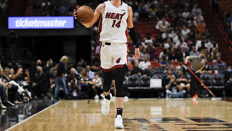 Mar 28, 2022; Miami, Florida, USA; Miami Heat guard Tyler Herro (14) dribbles the basketball during the second quarter against the Sacramento Kings at FTX Arena. Mandatory Credit: Sam Navarro-USA TODAY Sports