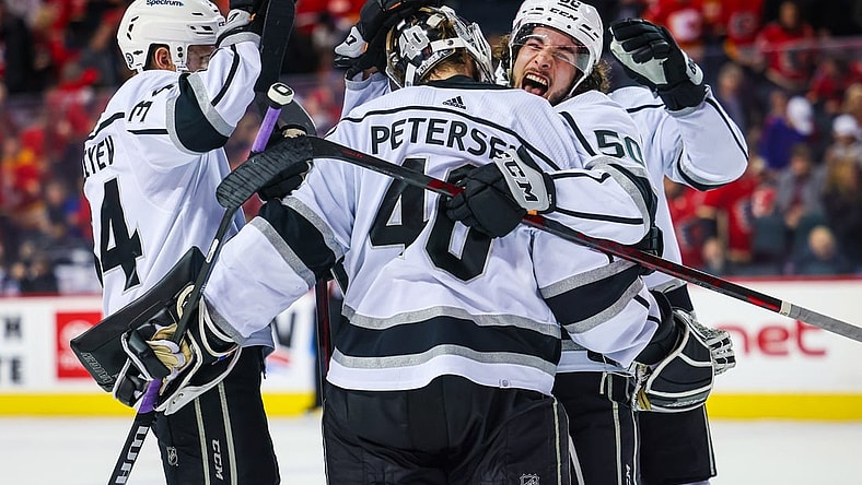 Mar 31, 2022; Calgary, Alberta, CAN; Los Angeles Kings goaltender Cal Petersen (40) celebrate win with teammates against the Calgary Flames at Scotiabank Saddledome. Mandatory Credit: Sergei Belski-USA TODAY Sports