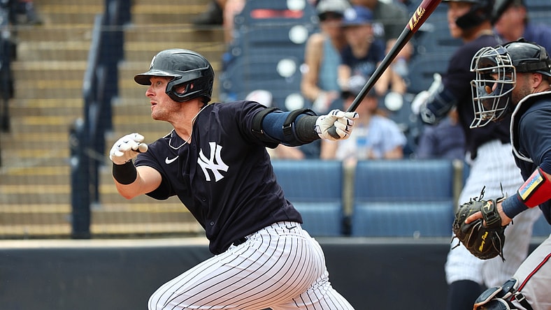 Apr 2, 2022; Tampa, Florida, USA; New York Yankees third baseman Josh Donaldson (28) hits a RBI single during the second inning against the Atlanta Braves during spring training at George M. Steinbrenner Field. Mandatory Credit: Kim Klement-USA TODAY Sports