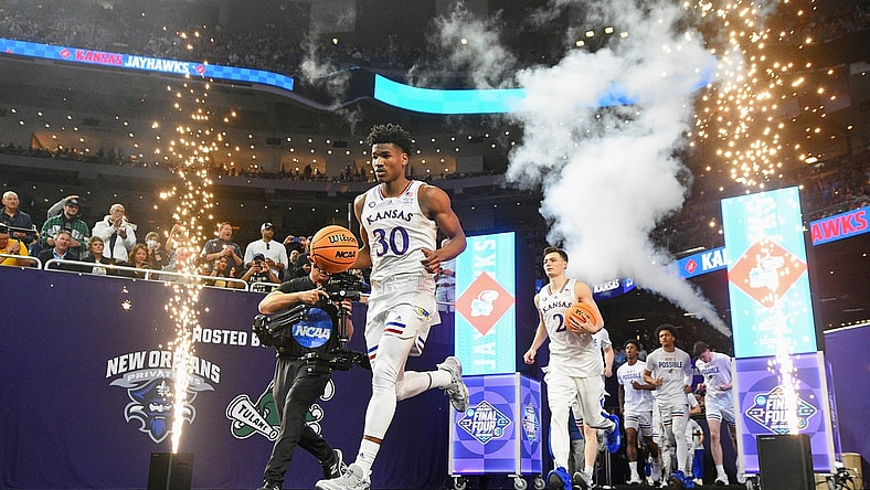 Apr 2, 2022; New Orleans, LA, USA; Kansas Jayhawks guard Ochai Agbaji (30) leads his team to the court before the game against the Villanova Wildcats during the 2022 NCAA men's basketball tournament Final Four semifinals at Caesars Superdome. Mandatory Credit: Bob Donnan-USA TODAY Sports