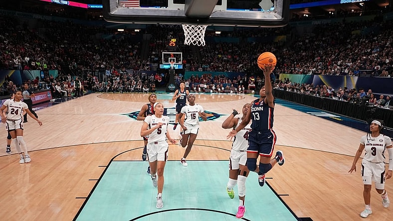 Apr 3, 2022; Minneapolis, MN, USA; UConn Huskies guard Christyn Williams (13) shoots the ball against the South Carolina Gamecocks  in the Final Four championship game of the women's college basketball NCAA Tournament at Target Center. Mandatory Credit: Kirby Lee-USA TODAY Sports