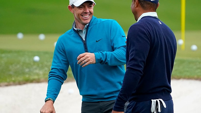Rory McIlroy shares a laugh with Tiger Woods during a practice round of the Masters at Augusta National Golf Club.

2022-4-5-rory-mcilroy