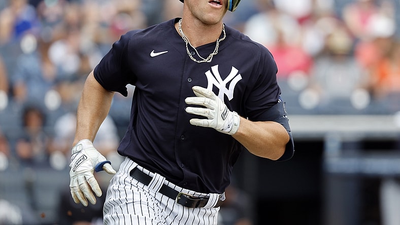Apr 5, 2022; Tampa, Florida, USA; New York Yankees right fielder Aaron Judge (99) singles during the first inning against the Detroit Tigers during spring training at George M. Steinbrenner Field. Mandatory Credit: Kim Klement-USA TODAY Sports