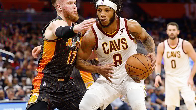 Apr 5, 2022; Orlando, Florida, USA;  Cleveland Cavaliers forward Lamar Stevens (8) drives to the basket guarded by Orlando Magic forward Ignas Brazdeikis (17) in the first half at Amway Center. Mandatory Credit: Nathan Ray Seebeck-USA TODAY Sports