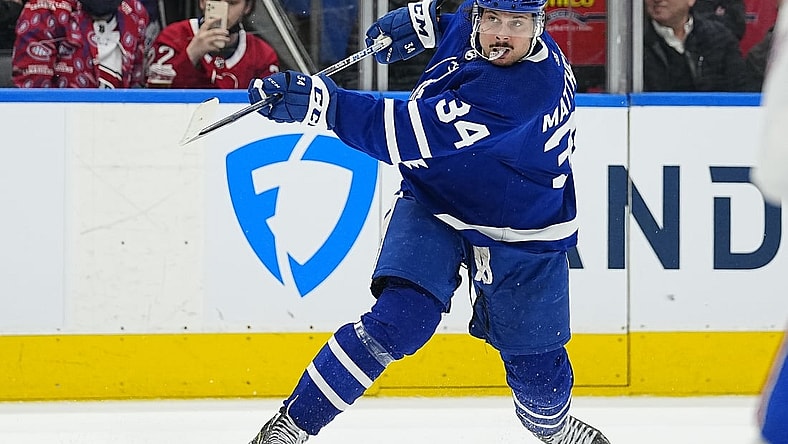 Apr 9, 2022; Toronto, Ontario, CAN; Toronto Maple Leafs forward Auston Matthews (34) shoots the puck against the Montreal Canadiens during the third period at Scotiabank Arena. Mandatory Credit: John E. Sokolowski-USA TODAY Sports