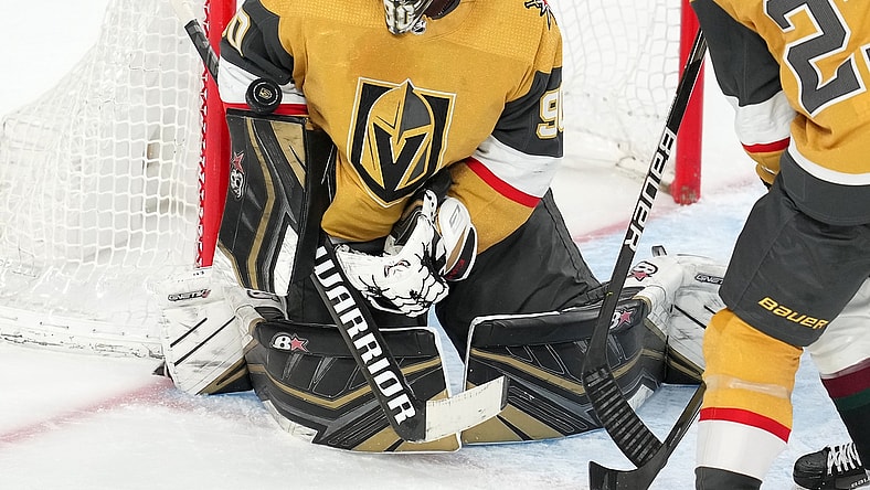 Apr 9, 2022; Las Vegas, Nevada, USA; Vegas Golden Knights goaltender Robin Lehner (90) makes a save against the Arizona Coyotes during the third period at T-Mobile Arena. Mandatory Credit: Stephen R. Sylvanie-USA TODAY Sports