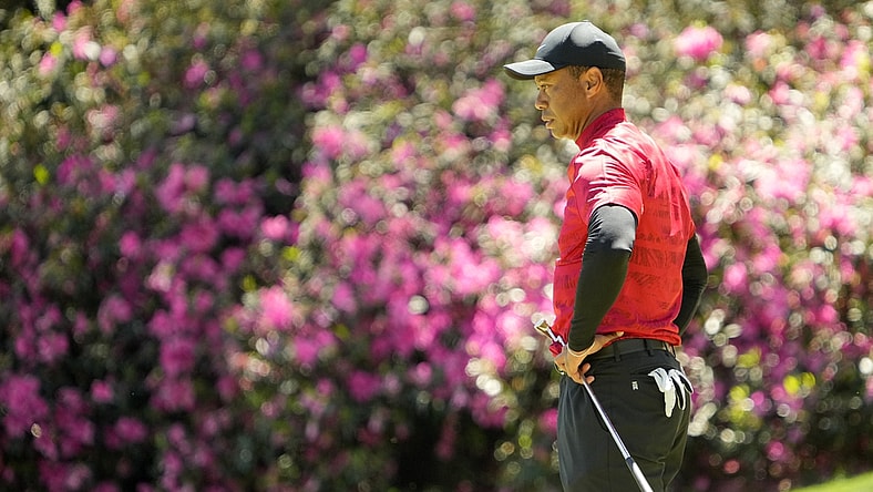 Apr 10, 2022; Augusta, Georgia, USA; Tiger Woods stands on the no. 13 green during the final round of the Masters Tournament at Augusta National Golf Club. Mandatory Credit: Adam Cairns-Augusta Chronicle/USA TODAY Sports