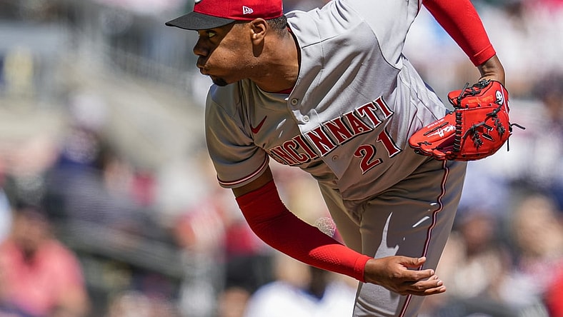 Apr 10, 2022; Cumberland, Georgia, USA; Cincinnati Reds starting pitcher Hunter Greene (21) pitches against the Atlanta Braves during the fourth inning at Truist Park. Mandatory Credit: Dale Zanine-USA TODAY Sports