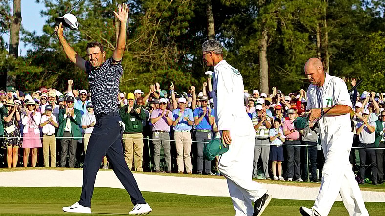 Apr 10, 2022; Augusta, Georgia, USA; Scott Scheffler celebrates after winning the Masters golf tournament. Mandatory Credit: Rob Schumacher-USA TODAY Sports