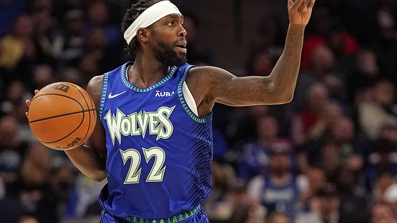 Apr 10, 2022; Minneapolis, Minnesota, USA; Minnesota Timberwolves guard Patrick Beverley (22) calls a play as he brings the ball up-court against the Chicago Bulls during the first quarter at Target Center. Mandatory Credit: Nick Wosika-USA TODAY Sports