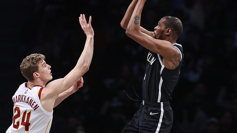 Apr 12, 2022; Brooklyn, New York, USA; Brooklyn Nets forward Kevin Durant (7) shoots the ball over Cleveland Cavaliers forward Lauri Markkanen (24) during the first half at Barclays Center. Mandatory Credit: Vincent Carchietta-USA TODAY Sports
