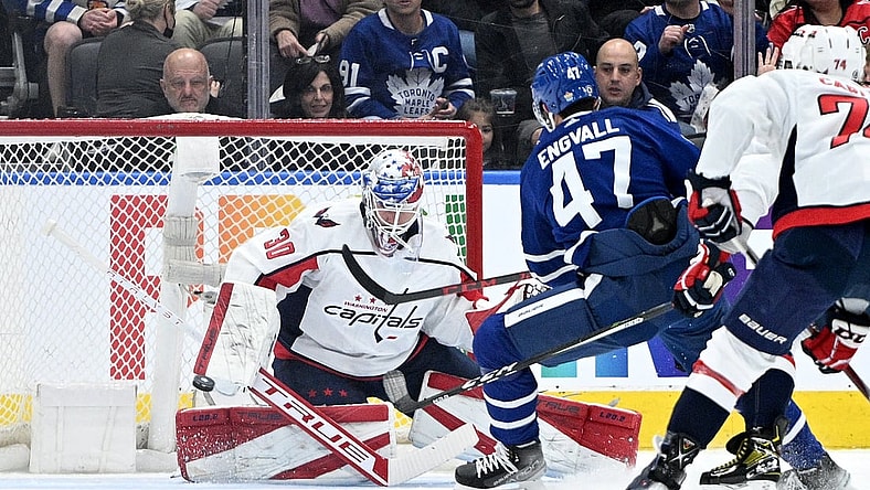 Apr 14, 2022; Toronto, Ontario, CAN;  Washington Capitals goalie Ilya Samsonov (30) makes a save on a shot from Toronto Maple Leafs forward Pierre Engvall (47) in the first  period at Scotiabank Arena. Mandatory Credit: Dan Hamilton-USA TODAY Sports