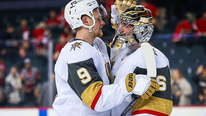Apr 14, 2022; Calgary, Alberta, CAN; Vegas Golden Knights center Jack Eichel (9) and goaltender Logan Thompson (36) celebrate win against the Calgary Flames at Scotiabank Saddledome. Mandatory Credit: Sergei Belski-USA TODAY Sports