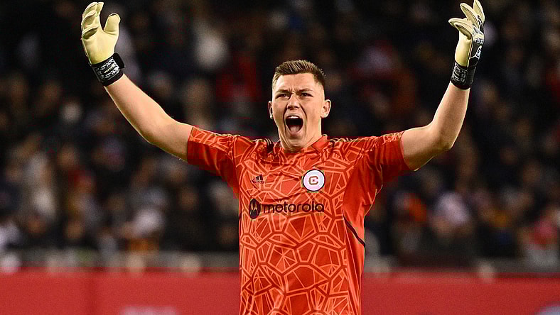 Apr 16, 2022; Chicago, Illinois, USA; Chicago Fire FC goalkeeper Gaga Slonina (1) revs up the crowd in the second half against the LA Galaxy at Soldier Field. Chicago Fire FC and LA Galaxy played to a 0-0 tie. Mandatory Credit: Jamie Sabau-USA TODAY Sports