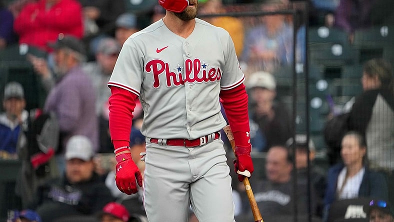 Apr 18, 2022; Denver, Colorado, USA; Philadelphia Phillies right fielder Bryce Harper (3) on deck in the first inning against the Colorado Rockies at Coors Field. Mandatory Credit: Ron Chenoy-USA TODAY Sports