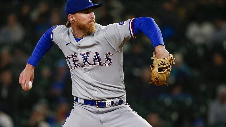 Apr 19, 2022; Seattle, Washington, USA; Texas Rangers starting pitcher Jon Gray (22) throws against the Seattle Mariners during the fourth inning at T-Mobile Park. Mandatory Credit: Joe Nicholson-USA TODAY Sports