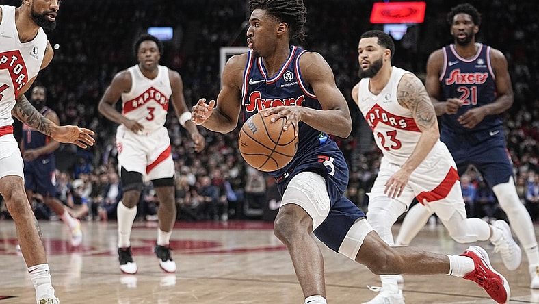 Apr 20, 2022; Toronto, Ontario, CAN; Philadelphia 76ers guard Tyrese Maxey (0) dribbles to the basket past Toronto Raptors guard Fred VanVleet (23) during the first half of game three of the first round for the 2022 NBA playoffs at Scotiabank Arena. Mandatory Credit: John E. Sokolowski-USA TODAY Sports