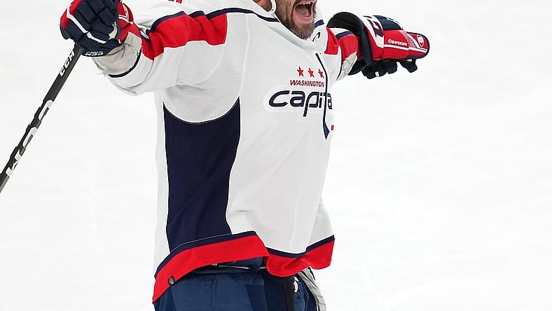 Apr 20, 2022; Las Vegas, Nevada, USA; Washington Capitals left wing Alex Ovechkin (8) celebrates after scoring his 50th goal of the season during the third period against the Vegas Golden Knights at T-Mobile Arena. Mandatory Credit: Stephen R. Sylvanie-USA TODAY Sports