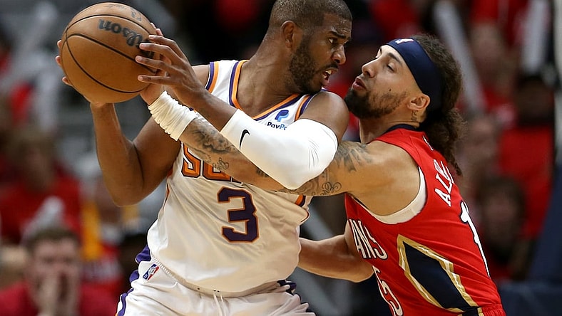 Apr 22, 2022; New Orleans, Louisiana, USA; Phoenix Suns guard Chris Paul (3) is defended by New Orleans Pelicans guard Jose Alvarado (15) in the second quarter of game three of the first round for the 2022 NBA playoffs at the Smoothie King Center. Mandatory Credit: Chuck Cook-USA TODAY Sports