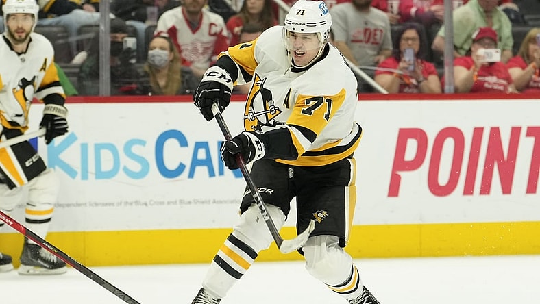 Apr 23, 2022; Detroit, Michigan, USA; Pittsburgh Penguins center Evgeni Malkin (71) takes a shot during the third period against the Detroit Red Wings at Little Caesars Arena. Mandatory Credit: Raj Mehta-USA TODAY Sports