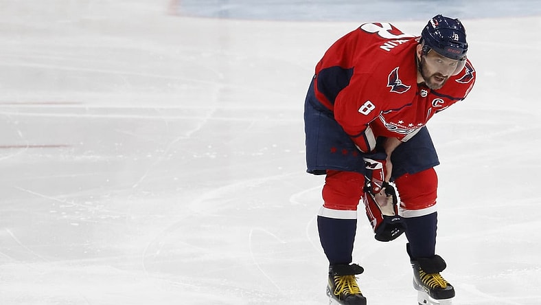 Apr 24, 2022; Washington, District of Columbia, USA; Washington Capitals left wing Alex Ovechkin (8) skates off the ice after being injured while crashing into the boards after being tripped on a breakaway attempt against the Toronto Maple Leafs in the third period at Capital One Arena. Mandatory Credit: Geoff Burke-USA TODAY Sports