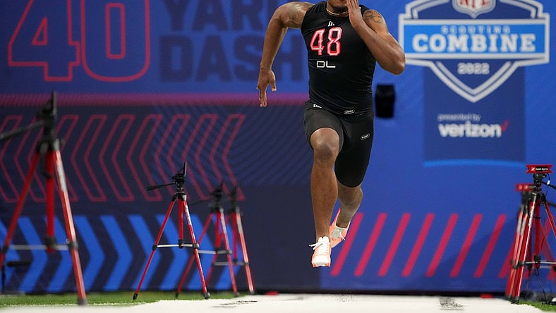 Mar 5, 2022; Indianapolis, IN, USA; Georgia defensive lineman Travon Walker (DL48) runs in the 40-yard dash during the 2022 NFL Scouting Combine at Lucas Oil Stadium. Mandatory Credit: Kirby Lee-USA TODAY Sports