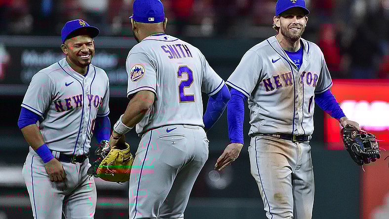 Apr 25, 2022; St. Louis, Missouri, USA;  New York Mets second baseman Jeff McNeil (1) and third baseman Eduardo Escobar (10) celebrate with first baseman Dominic Smith (2) after the Mets defeated the St. Louis Cardinals at Busch Stadium. Mandatory Credit: Jeff Curry-USA TODAY Sports