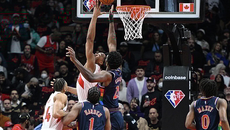 Apr 28, 2022; Toronto, Ontario, CAN;  Toronto Raptors forward Scottie Barnes (4) shoots for a basket against Philadelphia 76ers center Joel Embiid (21) in the first half during game six of the first round for the 2022 NBA playoffs at Scotiabank Arena. Mandatory Credit: Dan Hamilton-USA TODAY Sports