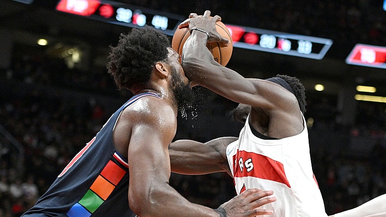 Apr 28, 2022; Toronto, Ontario, CAN;  Toronto Raptors forward Pascal Siakam (43) elbows Philadelphia 76ers center Joel Embiid (21) in the face as he drives to the basket during the second half of game six of the first round for the 2022 NBA playoffs at Scotiabank Arena. Mandatory Credit: Dan Hamilton-USA TODAY Sports