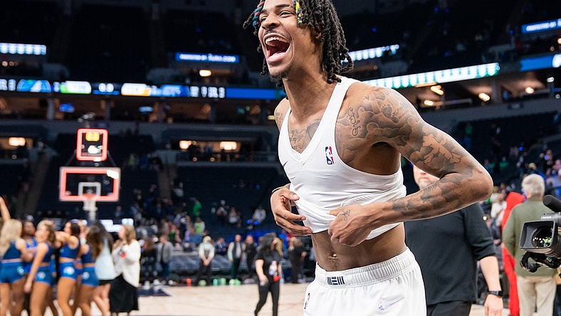 Apr 29, 2022; Minneapolis, Minnesota, USA; Memphis Grizzlies guard Ja Morant (12) celebrates after the game against the Minnesota Timberwolves after game six of the first round for the 2022 NBA playoffs at Target Center. Mandatory Credit: Brad Rempel-USA TODAY Sports
