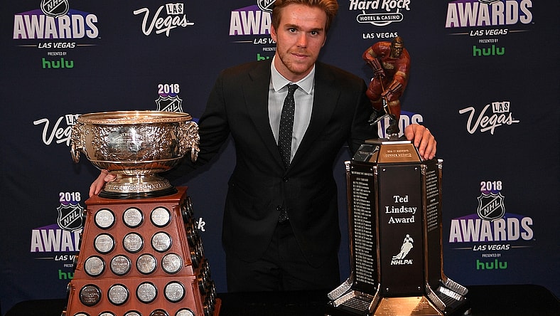 Jun 20, 2018; Las Vegas, NV, USA; Connor McDavid poses with the Art Ross and Ted Lindsay awards during the 2018 NHL Awards at Hard Rock Hotel and Casino. Mandatory Credit: Stephen R. Sylvanie-USA TODAY Sports