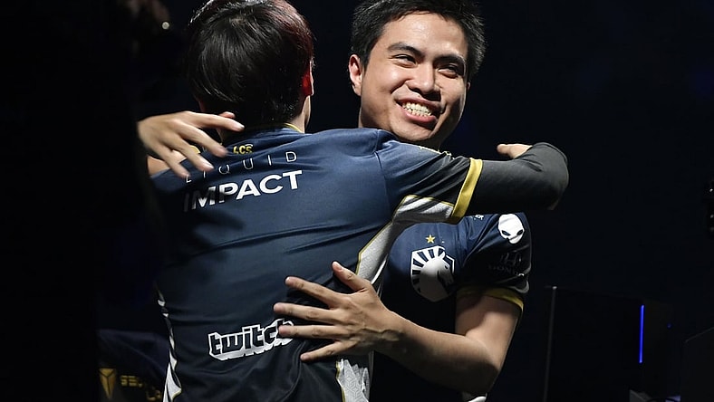 Apr 13, 2019; St. Louis , MO, USA; Team Liquid member Jake Puchero hugs Eonyoung Jeong after defeating TSM in the fifth game to win the League of Legends Championship Series Spring Finals at Chaifetz Arena. Mandatory Credit: Jeff Curry-USA TODAY Sports