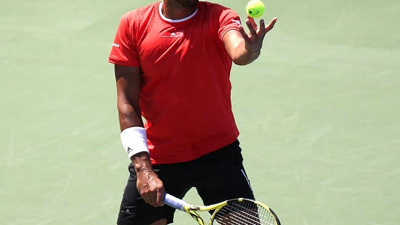 Aug 5, 2019; Montreal, Quebec, Canada; Jo-Wilfried Tsonga from France serves against Jan-Lennard Struff from Germany (not pictured) during the Rogers Cup tennis tournament at Stade IGA. Mandatory Credit: Jean-Yves Ahern-USA TODAY Sports