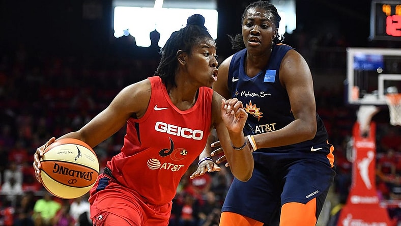 Sep 29, 2019; Washington, DC, USA; Washington Mystics guard Ariel Atkins (7) dribbles the ball against Connecticut Sun forward Shekinna Stricklen (40) during the first quarter in game one of the 2019 WNBA Finals at The Entertainment and Sports Arena. Mandatory Credit: Brad Mills-USA TODAY Sports