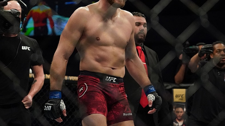 Feb 15, 2020; Rio Rancho, New Mexico, USA; Corey Anderson (red) fights Jan Blachowicz (blue) in the light heavyweight bout during UFC Fight Night at Santa Ana Star Arena. Mandatory Credit: Kirby Lee-USA TODAY Sports