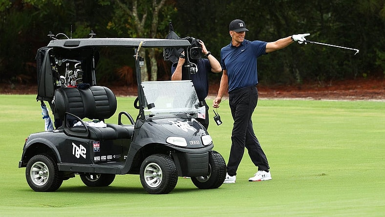 May 24, 2020; Hobe Sound, FL, USA; NFL player Tom Brady of the Tampa Bay Buccaneers reacts after holing out from the fairway on the seventh during The Match: Champions for Charity golf round at the Medalist Golf Club.  Mandatory Credit: Handout Photo by Getty Images for The Match via USA TODAY Sports