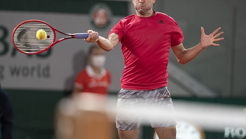 Sep 29, Paris, France; Gilles Simon (FRA) in action during his match against Denis Shapovalov (CAN) on day three at Stade Roland Garros. Mandatory Credit: Susan Mullane-USA TODAY Sports