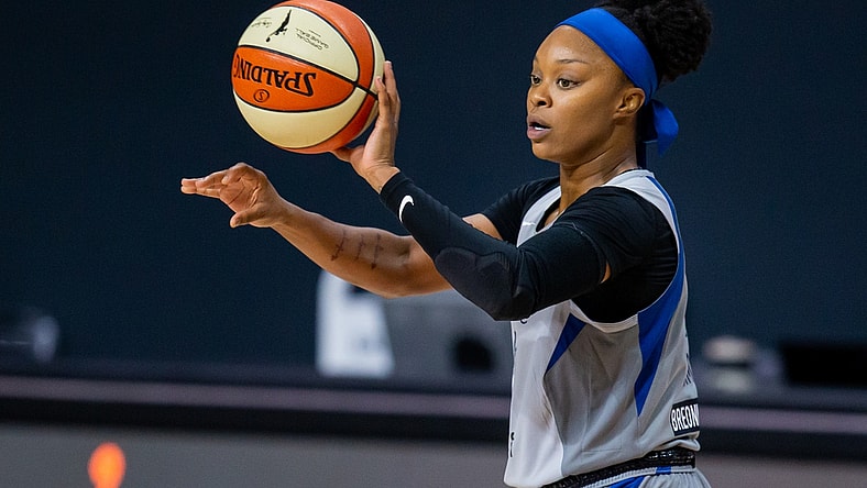 Sep 24, 2020; Bradenton, Florida, USA; Minnesota Lynx guard Odyssey Sims (1) passes the ball during Game 2 of the WNBA Semifinals against the Seattle Storm at Feld Entertainment. Mandatory Credit: Mary Holt-USA TODAY Sports