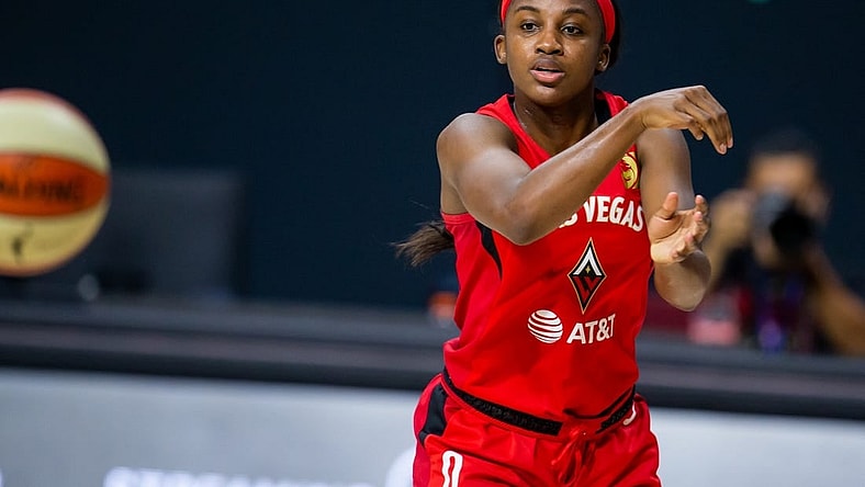 Sep 24, 2020; Bradenton, Florida, USA; Las Vegas Aces guard Jackie Young (0) passes during game 3 of the WNBA semi-finals at Feld Entertainment. Mandatory Credit: Mary Holt-USA TODAY Sports